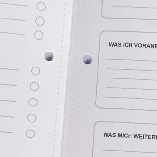Detailansicht eines mit Designvorlage gedruckten Notizblockes mit Softcover DIN A5 hoch