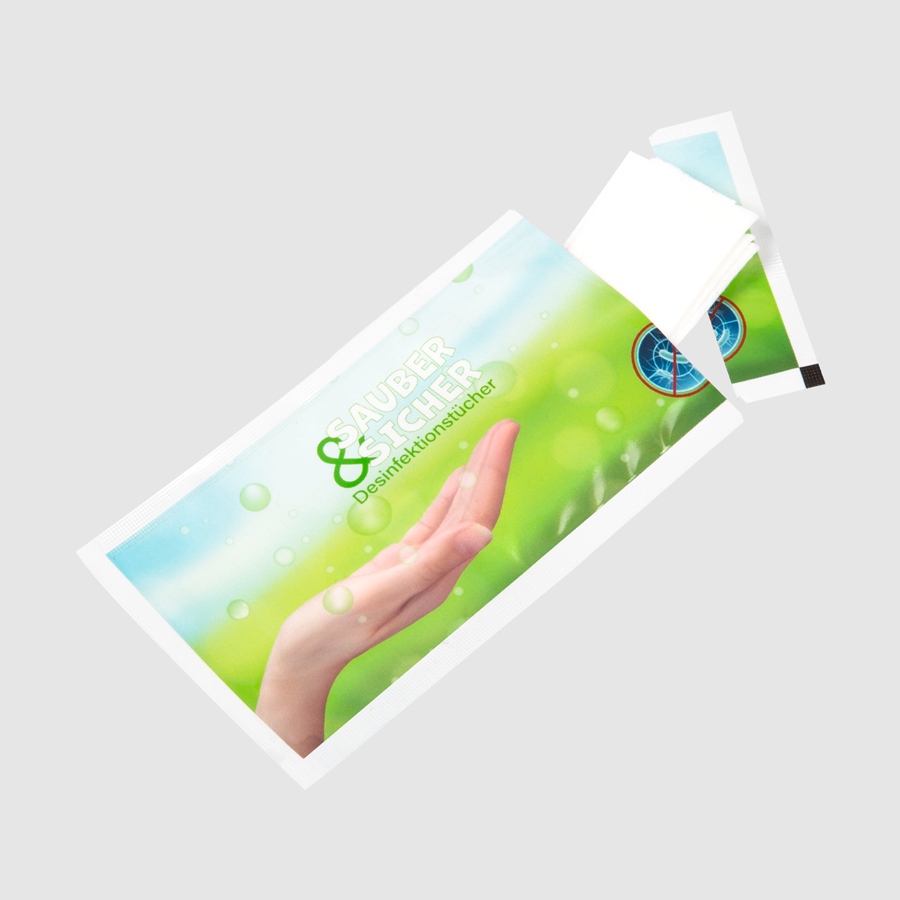 Hände-Desinfektionstuch in individuell bedrucktem Sachet, geöffnet