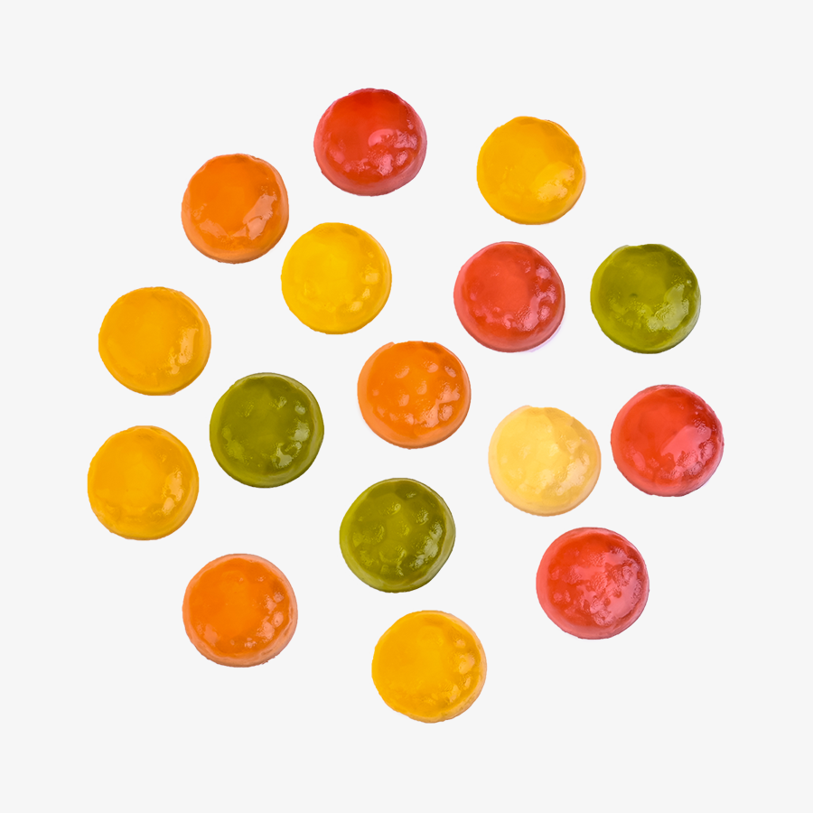 HARIBO-Fußbälle in verschiedenen Farben und Geschmacksrichtungen, im Kreis angeordnet